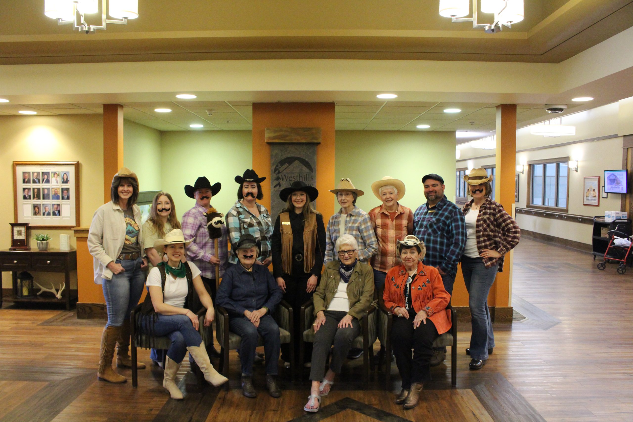 Westhills Village employees and residents dressed in cowboy gear